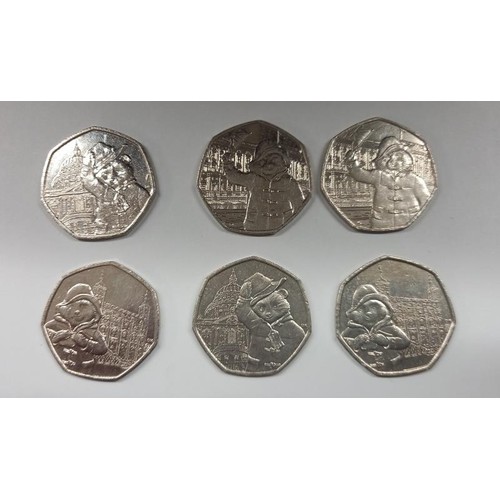 1162 - Twelve collectable Paddington Bear 50 pence coins (face value £6).