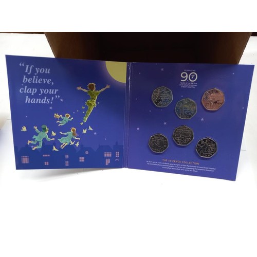 1170 - A Peter Pan, Beatrix Potter and The Pantomime 50 pence coin collections.