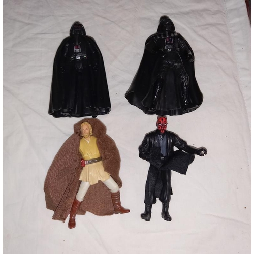 102 - A collection of Star Wars items including figures, cards, books & games including Monopoly & model k... 