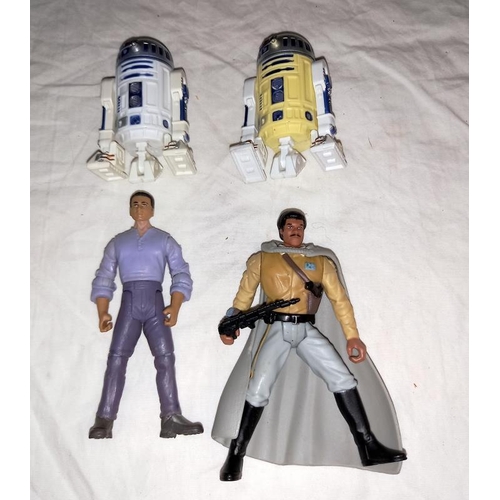 102 - A collection of Star Wars items including figures, cards, books & games including Monopoly & model k... 