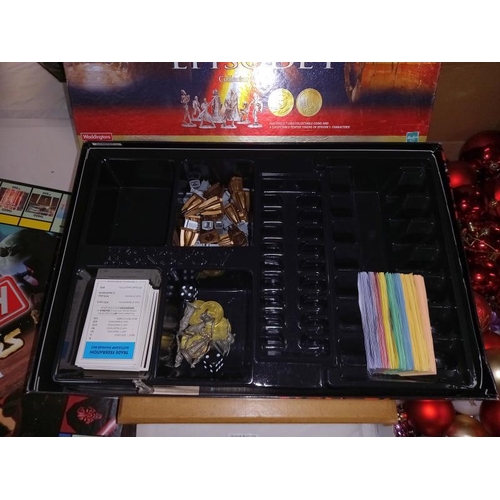 102 - A collection of Star Wars items including figures, cards, books & games including Monopoly & model k... 