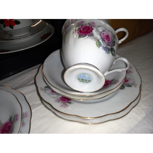 104 - 2 floral tea sets