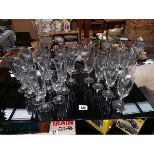 125 - 2 good lots of wine & champagne glasses