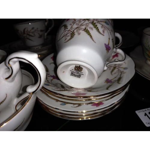 128 - A quantity of bone china part tea sets including Paragon etc.