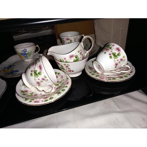 128 - A quantity of bone china part tea sets including Paragon etc.