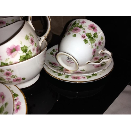 128 - A quantity of bone china part tea sets including Paragon etc.