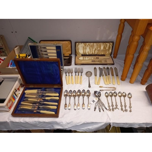 26 - 4 case cutlery sets including fish knives and forks and Italian spoons