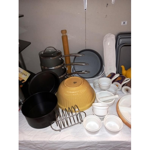 35 - A good selection of kitchenware including saucepan set, Denby and T G Green bowls etc