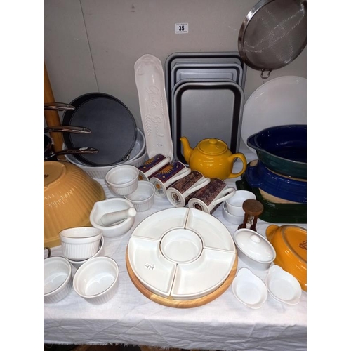 35 - A good selection of kitchenware including saucepan set, Denby and T G Green bowls etc