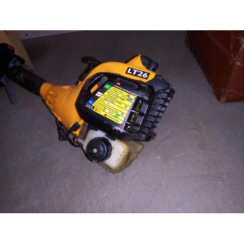 47 - A JCB petrol strimmer, pull cord is free