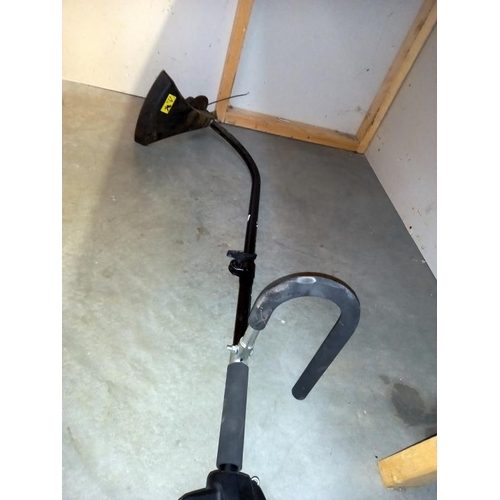 47 - A JCB petrol strimmer, pull cord is free