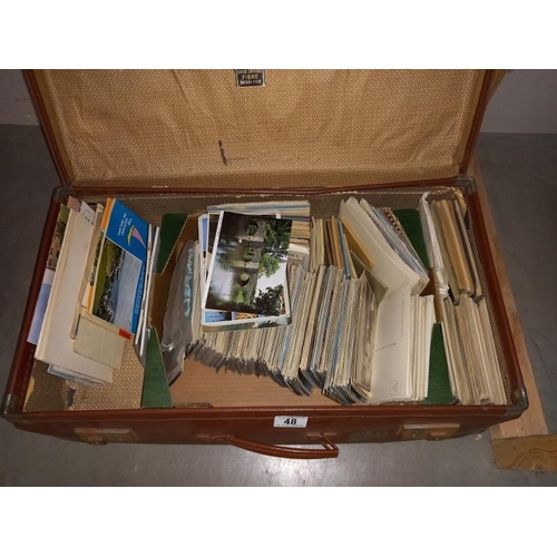 48 - A case full of postcards and guide books etc