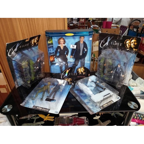 74 - A Barbie and Ken The X-Files gift set and 4 X files figures, all boxed