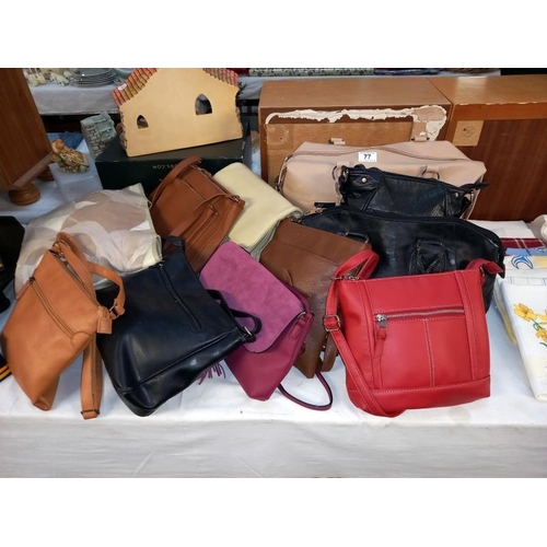 77 - A good selection of ladies handbags