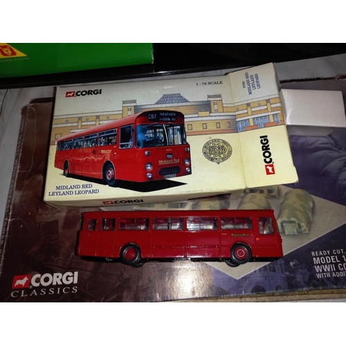 82 - A quantity of boxed diecast including Corgi buses, Schuco BMW Isetta Brumm, cuclecar etc