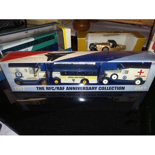 82 - A quantity of boxed diecast including Corgi buses, Schuco BMW Isetta Brumm, cuclecar etc