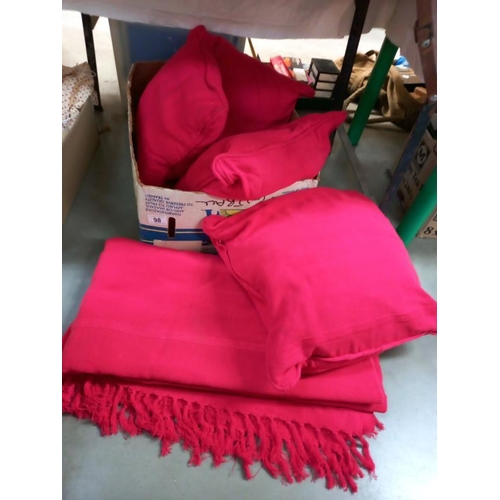 98 - 4 red cushions and a matching red throw