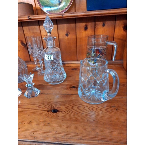 131 - 2 cut glass decanters, & a pair of Nachtmann German crystal candle holders etc