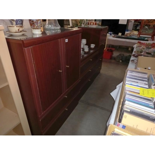 140 - Dark wood stained bedroom chests including a pair of bedsides & Gent's cupboard with 2 drawers