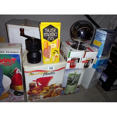 143 - A good selection of boxed kitchen items including food steamer & water dispenser etc.