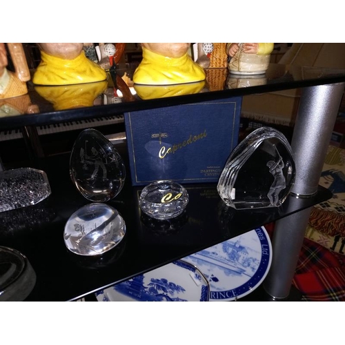 173 - A good selection of golf related glass paperweights & trophies