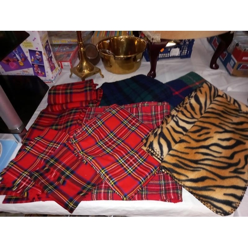 175 - A quantity of tartan scarves & blankets