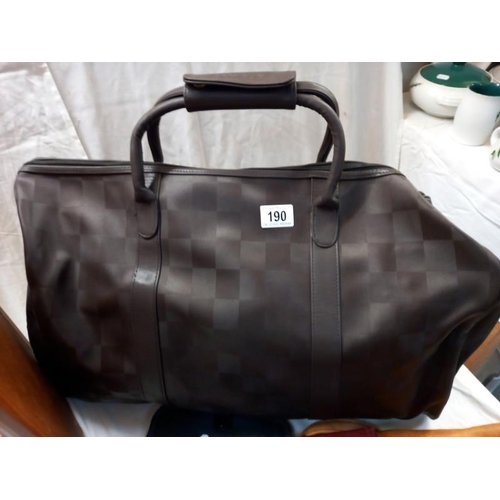 190 - A large Aramis holdall, 2 handbags & 1 other