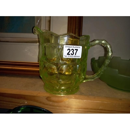 237 - A vintage green glass jug & bowl