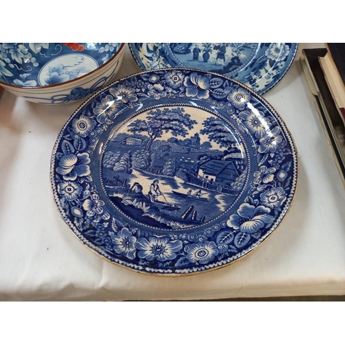 248 - A Chinese blue & white bowl with red bunches of grapes & 2 19th/20th century blue Willow plates