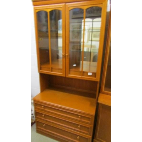 1460 - A good quality display cabinet with two glazed doors and three drawers, in as new condition. COLLECT... 