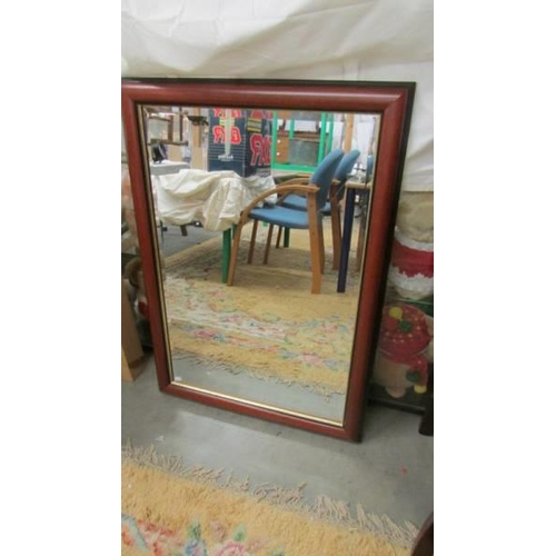 1474 - A mahogany framed bevel edged mirror. COLLECT ONLY.