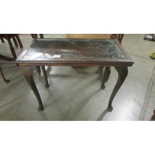 1479 - A pad foot table with carved top. COLLECT ONLY.