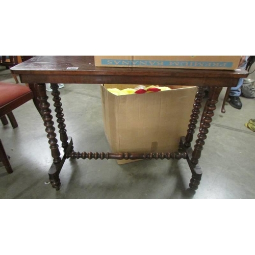 1480 - A mahogany side table with bobbin turned legs. COLLECT ONLY.