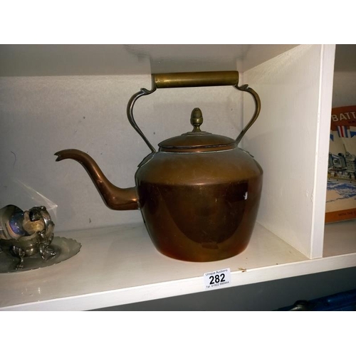 282 - A large vintage copper kettle