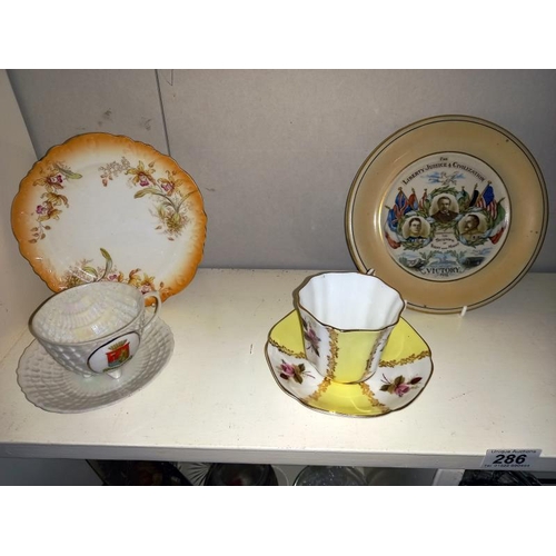 286 - Two Victorian moustache cups, a Scarborough crested tea cup with saucer and Royal Grafton tea cup wi... 