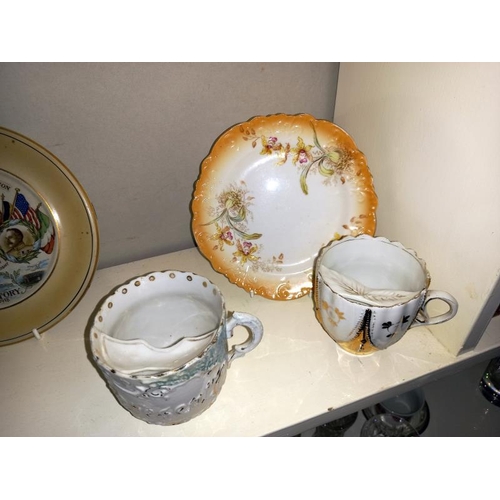 286 - Two Victorian moustache cups, a Scarborough crested tea cup with saucer and Royal Grafton tea cup wi... 