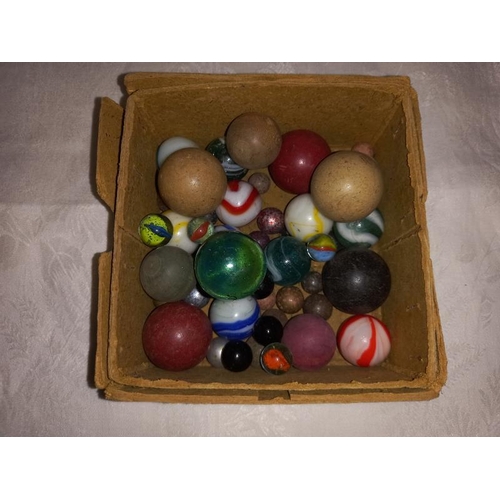 310 - A box of vintage marbles (COLLECT ONLY.)