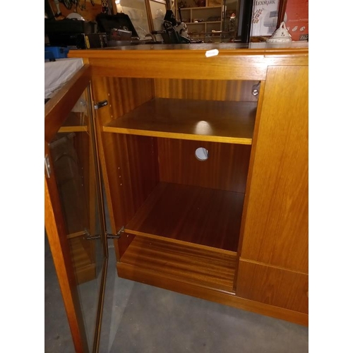 369 - A teak effect music centre cabinet with cutglass door and lift up lid 89cm x 49cm x height 81cm