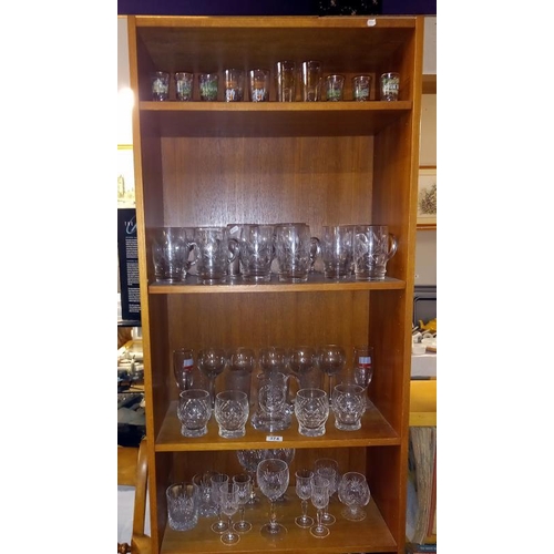 374 - Good lot of drinking glasses on 4 shelves