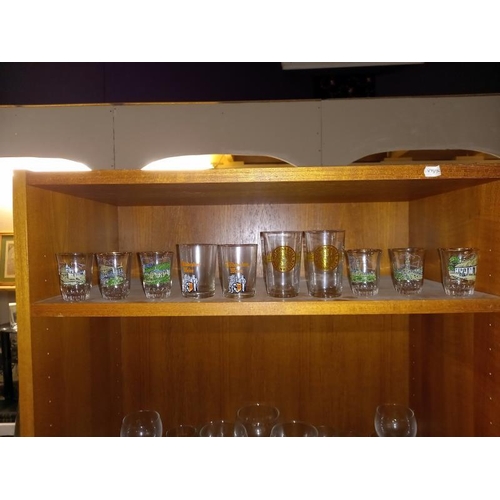 374 - Good lot of drinking glasses on 4 shelves