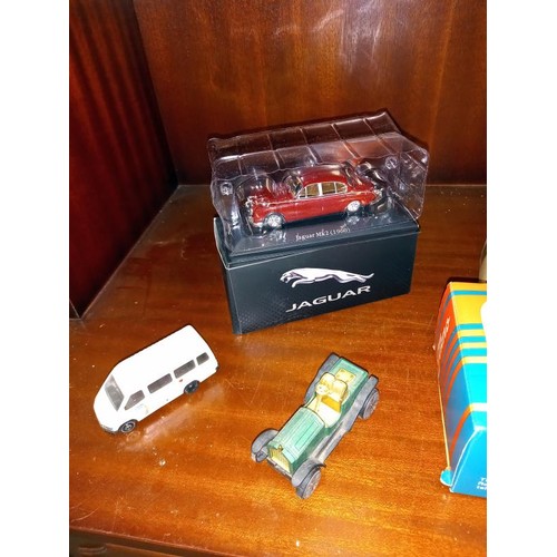 479 - A boxed Tekno lorry, box is missing it's window film, a boxed Jaguar Mk2 (Atlas edition), Grand Prix... 