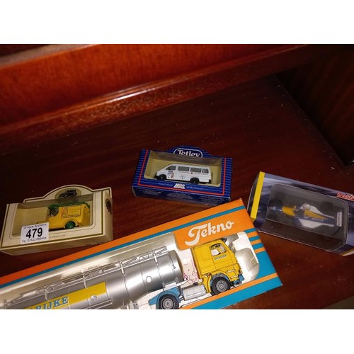 479 - A boxed Tekno lorry, box is missing it's window film, a boxed Jaguar Mk2 (Atlas edition), Grand Prix... 