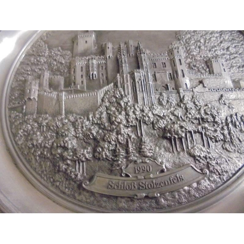 609 - A boxed WMF plate with embossed castle scene.