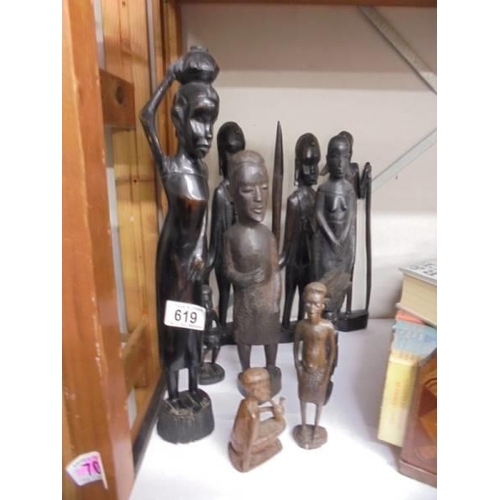 619 - Ten carved wood tribal figures.