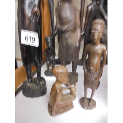 619 - Ten carved wood tribal figures.