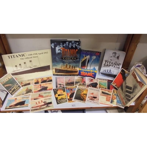 623 - A collection of Titanic related books and Cunard Line postcards.