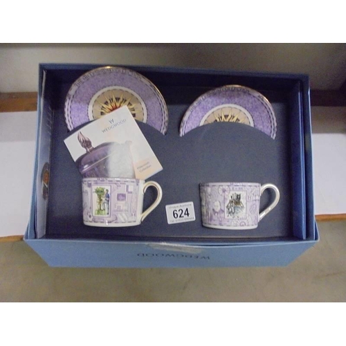 624 - A boxed pair of Wedgwood Millenium tea cups and saucers.