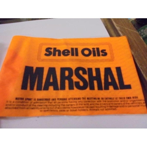 664 - A vintage Shell Oils and Castrol Rally Marshall armbands, an AA car badge and a Austin 7 club magazi... 