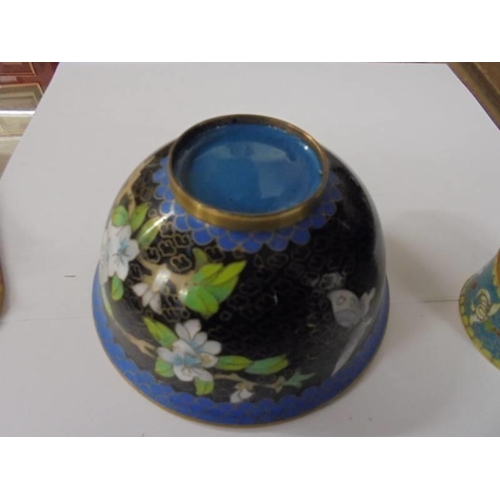 670 - A Chinese Cloissonne enamel bowl and napkin ring.