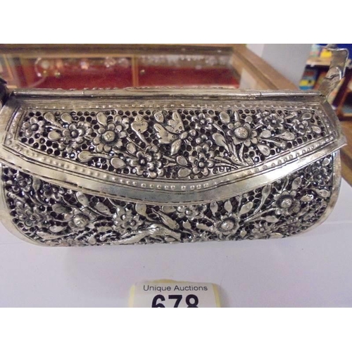 678 - A decorative white metal evening bag.